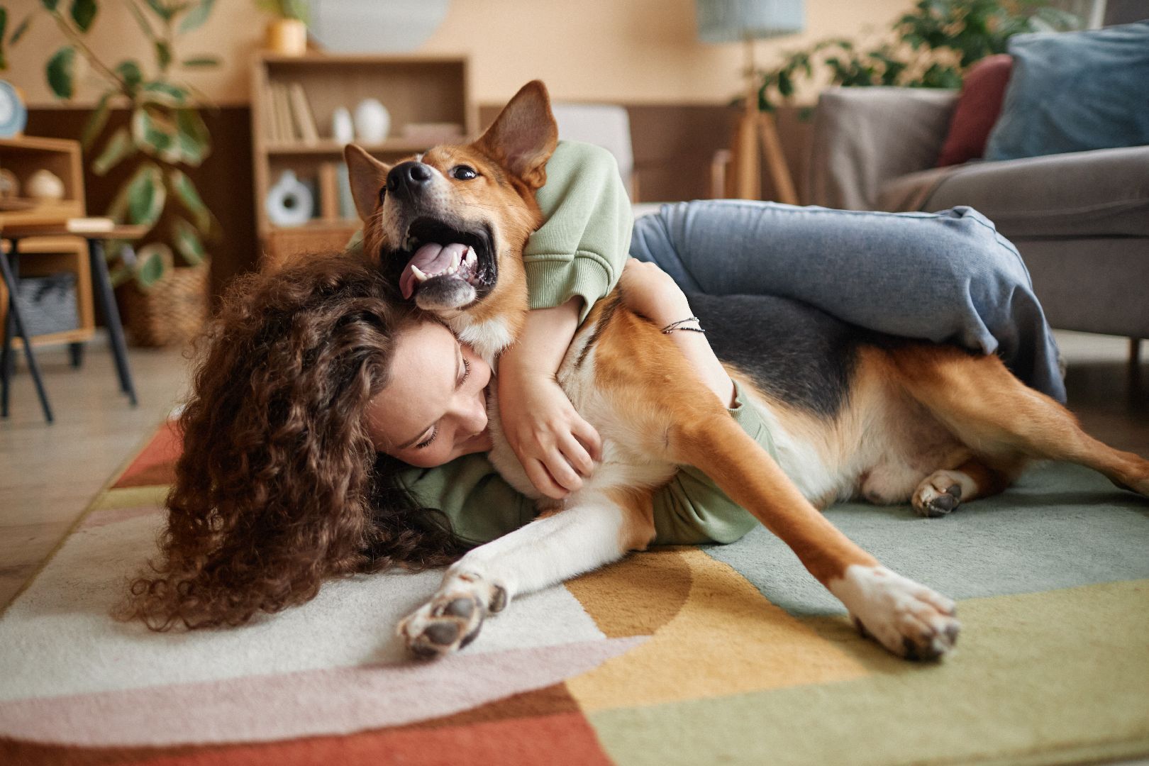 An owner building trust and a positive relationship with her dog
